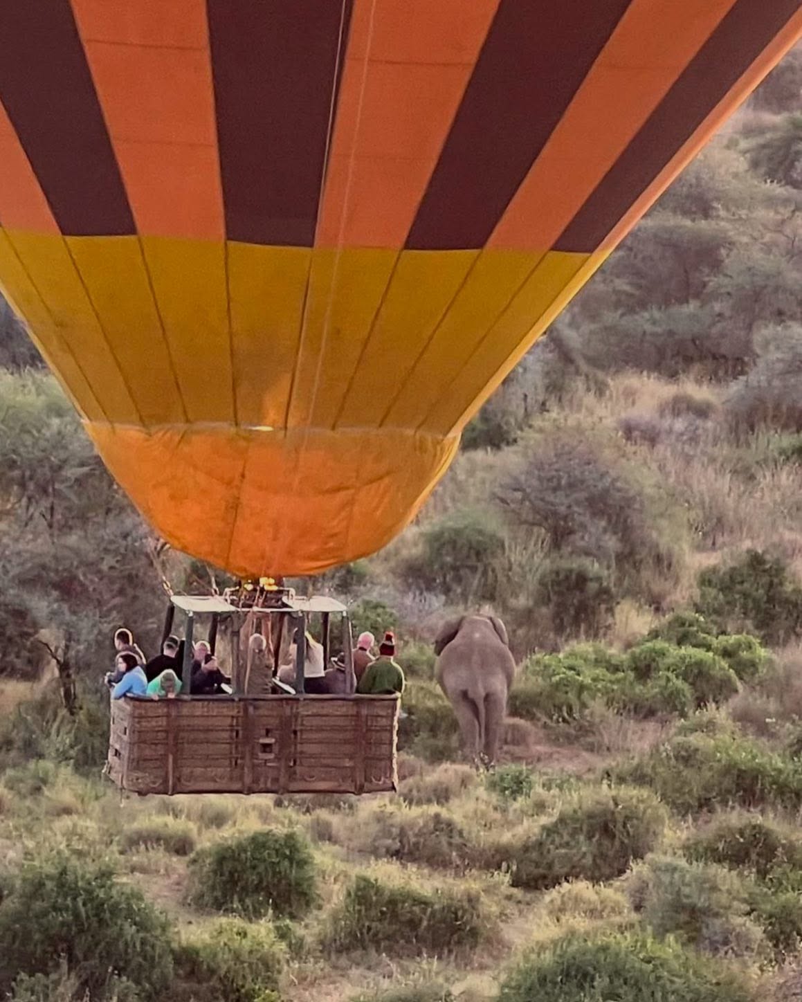 View from a hot air balloon over wildlife and Maasai communities in Amboseli