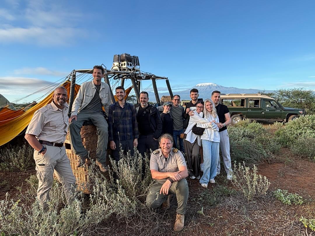 Kenya Balloon Safaris team member speaking with guests